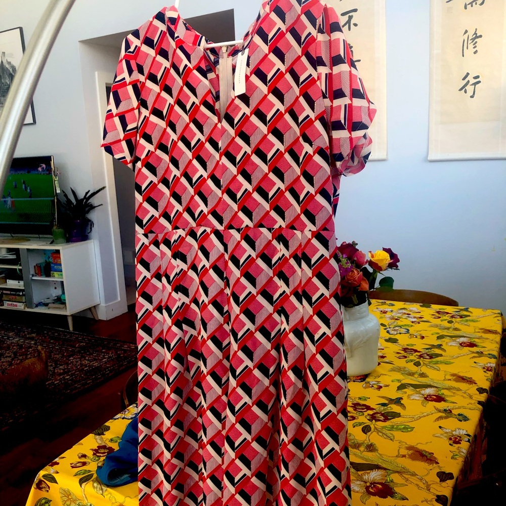 Adorable stylish red & navy Anthropolgie jumpsuit to your holiday party